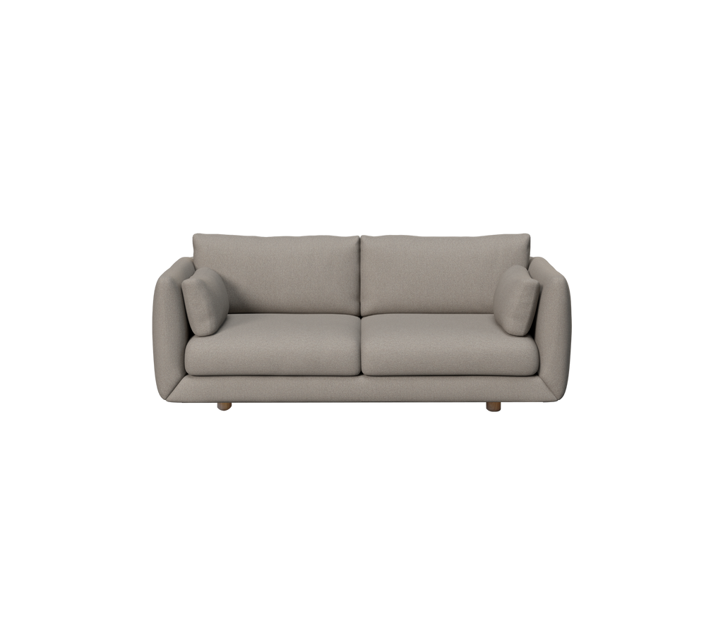 Lysbrun moderne sofa med runde puder i en loungestil.