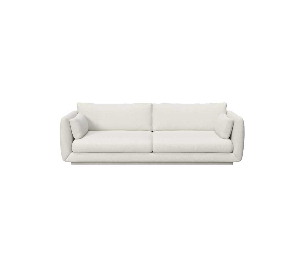 en moderne hvid sofa med et minimalistisk design.