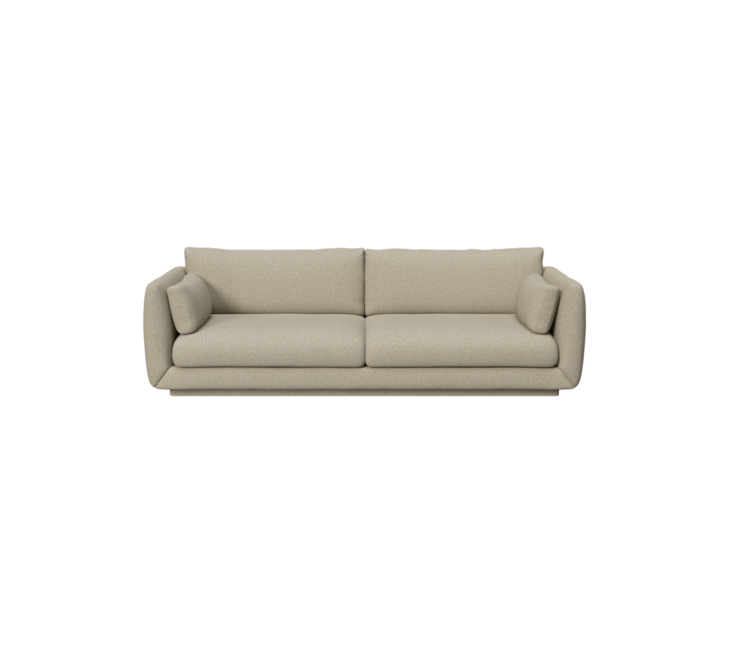 Brun moderne sofa med plysklude i en loungestemning.