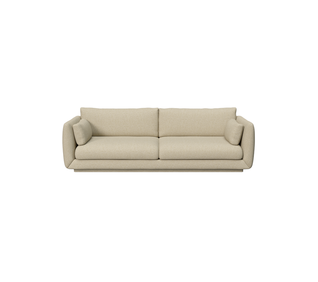 Lysbrun moderne sofa med puder i et minimalistisk design.