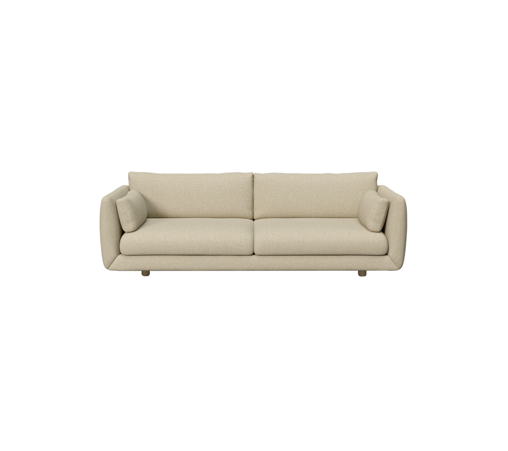 Lysbrun moderne sofa med runde puder.
