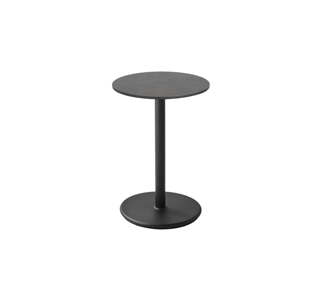 Et elegant sort sidebord med en rund top og en robust base, perfekt til alsidig styling i forskellige rum.