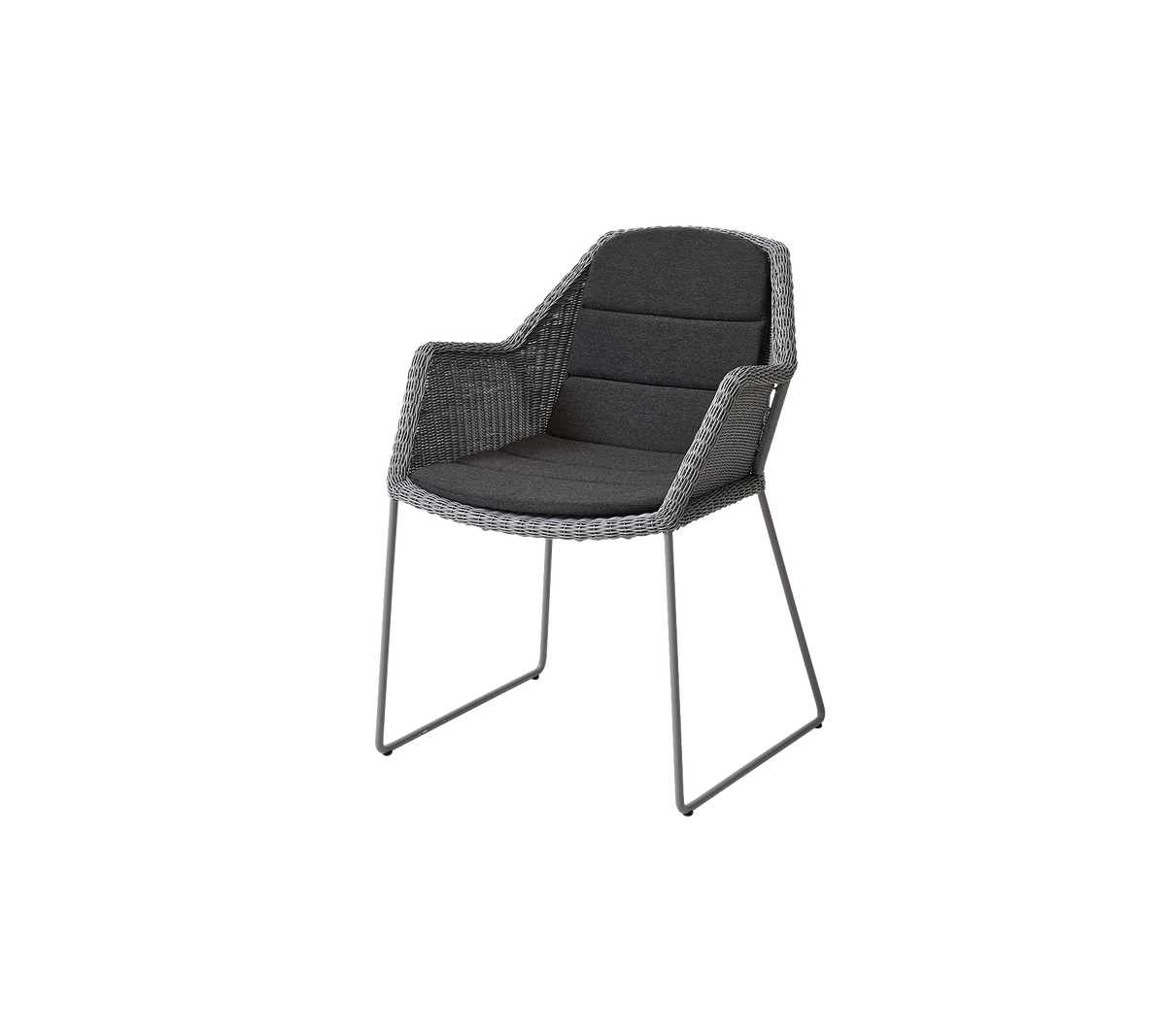 Stilfuld stol med et vævet design, bløde puder og slanke metalben, ideel til moderne indretning.