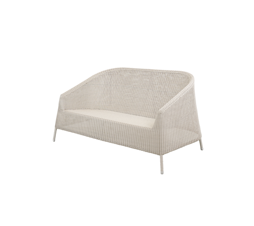 Moderne sand sofa med minimalistisk design.