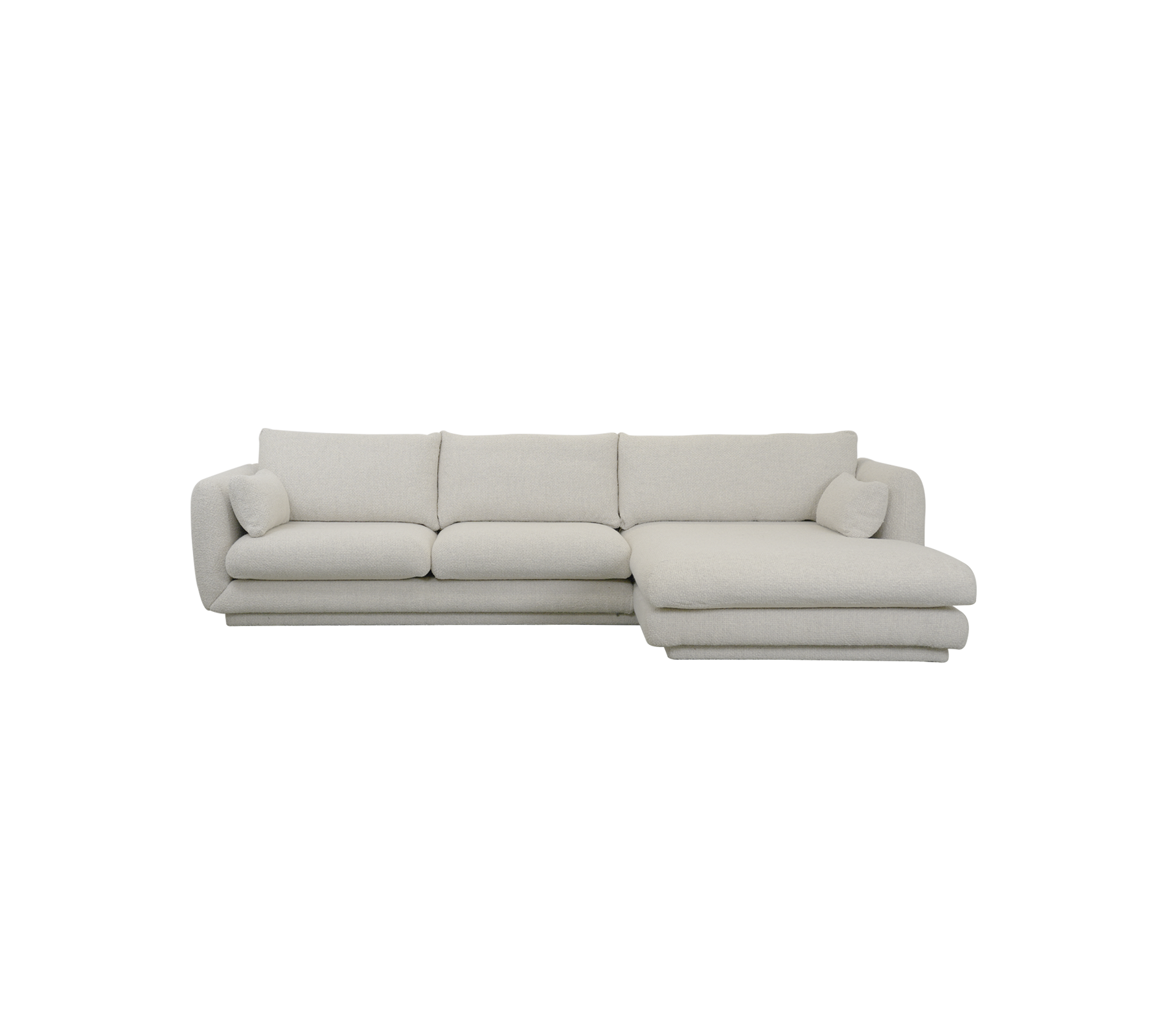 Moderne sandfarvet sofa med rene linjer og bløde puder.