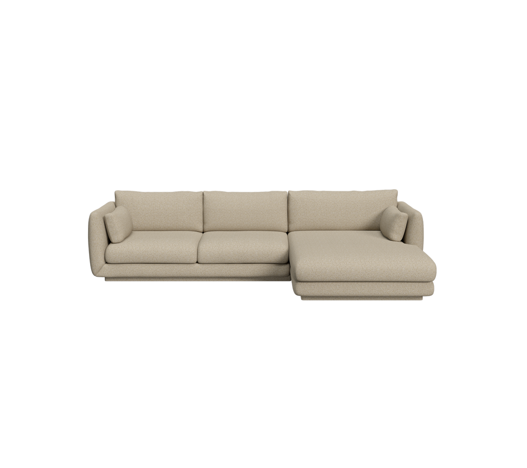 Brun moderne sofa med en chaiselong i en loungeindstilling.