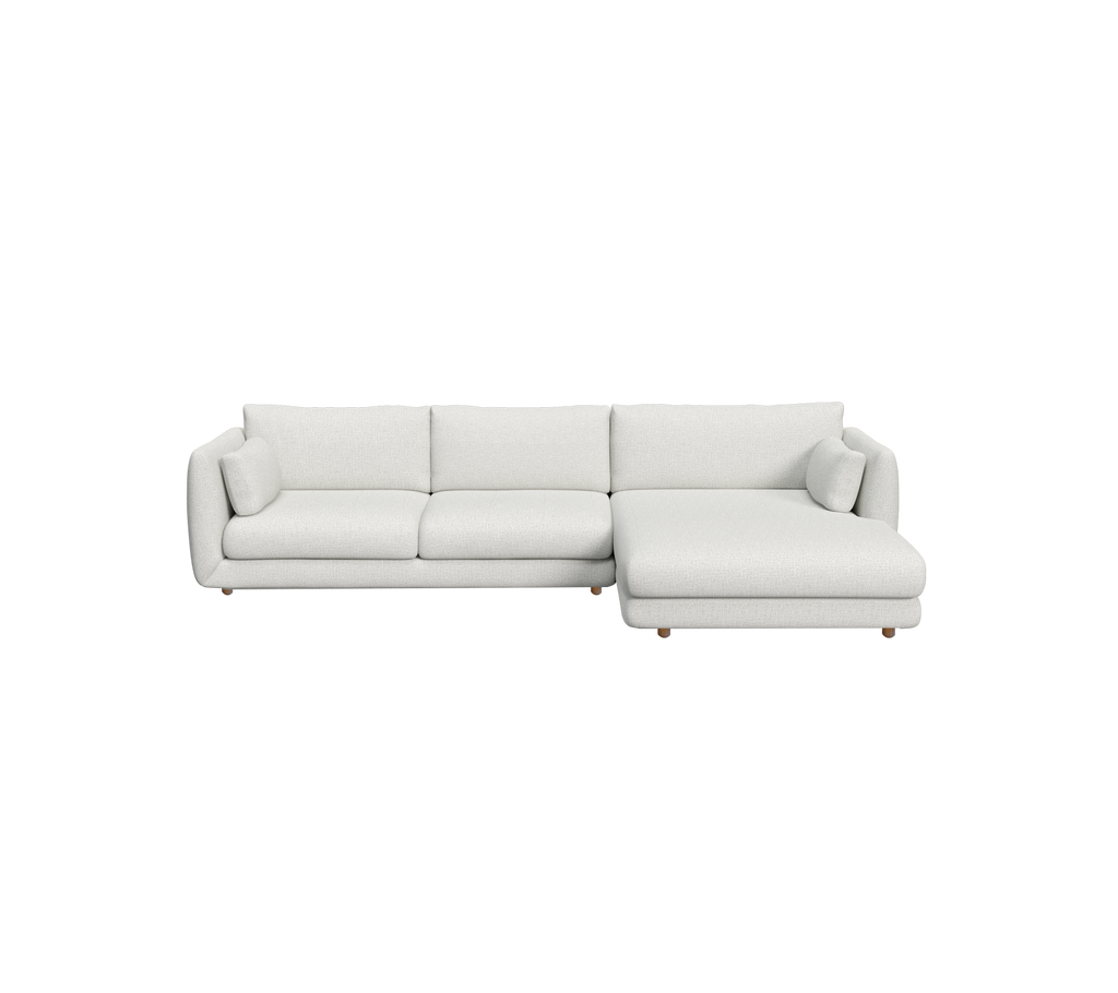 Lys grå moderne sektionel sofa med et rent design.