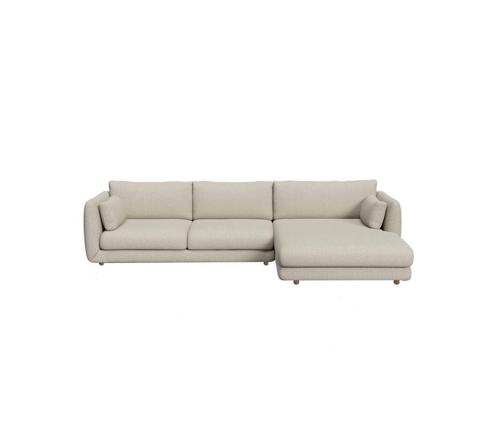 Lysebrunt sektionelt sofa med moderne design og bløde puder.