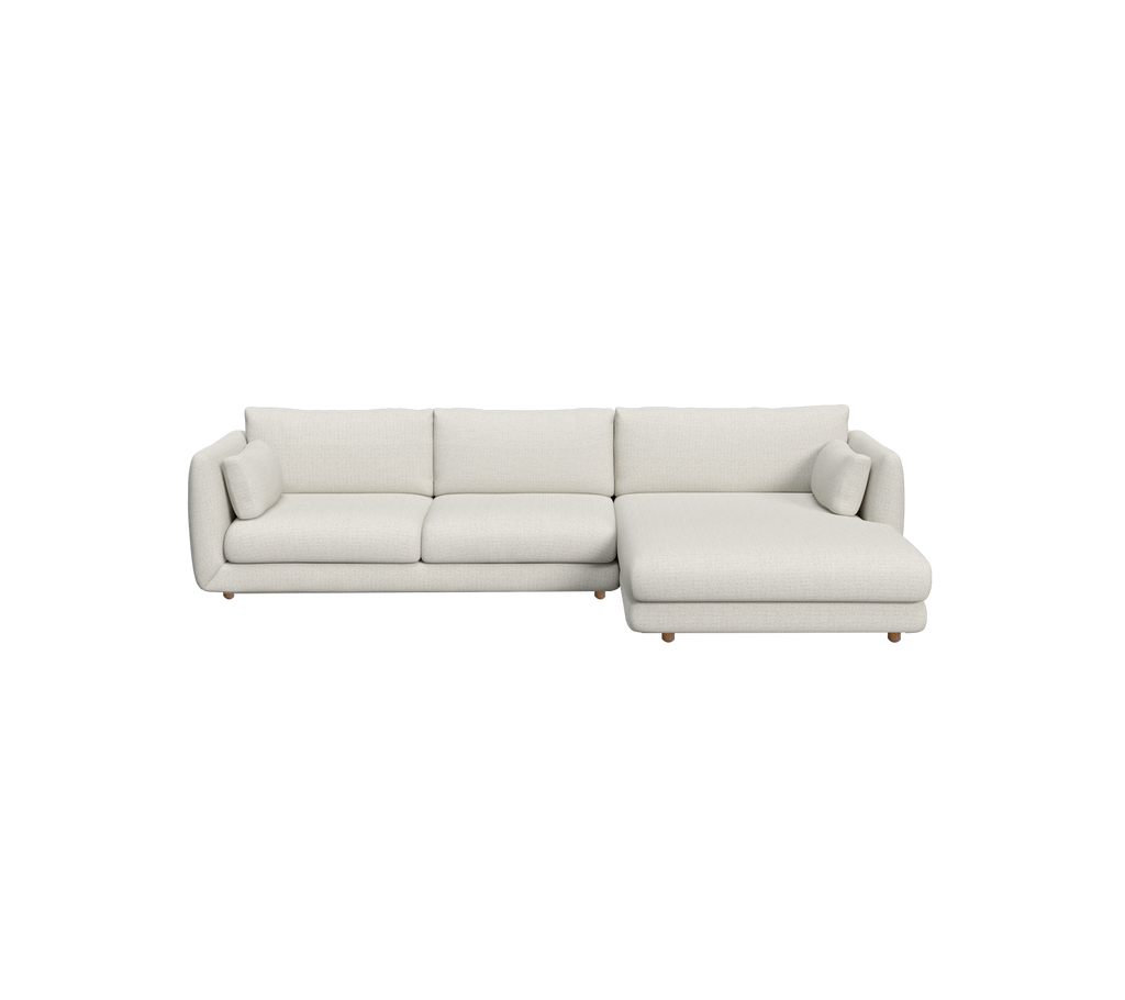 Sand sektionelt sofa med et moderne design.