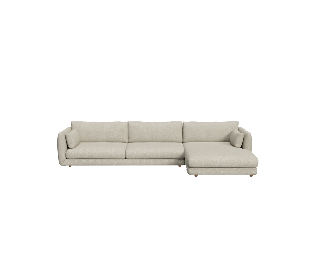 Lys brun sektion sofa i en moderne loungeindstilling.