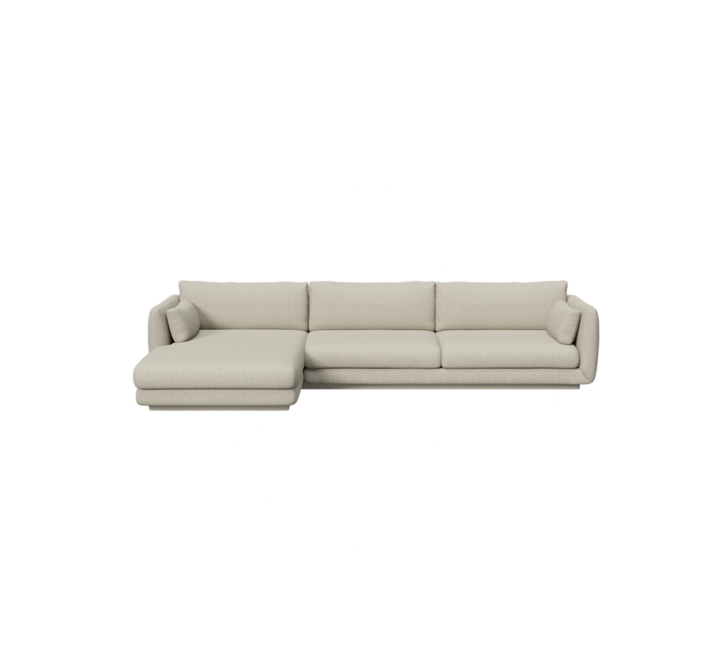 Lys brun sektion sofa i et moderne loungemiljø.