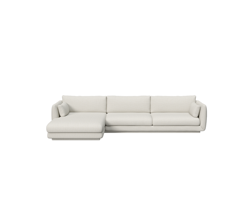 Modern sandfarvet sektionelt sofa med et rent design.
