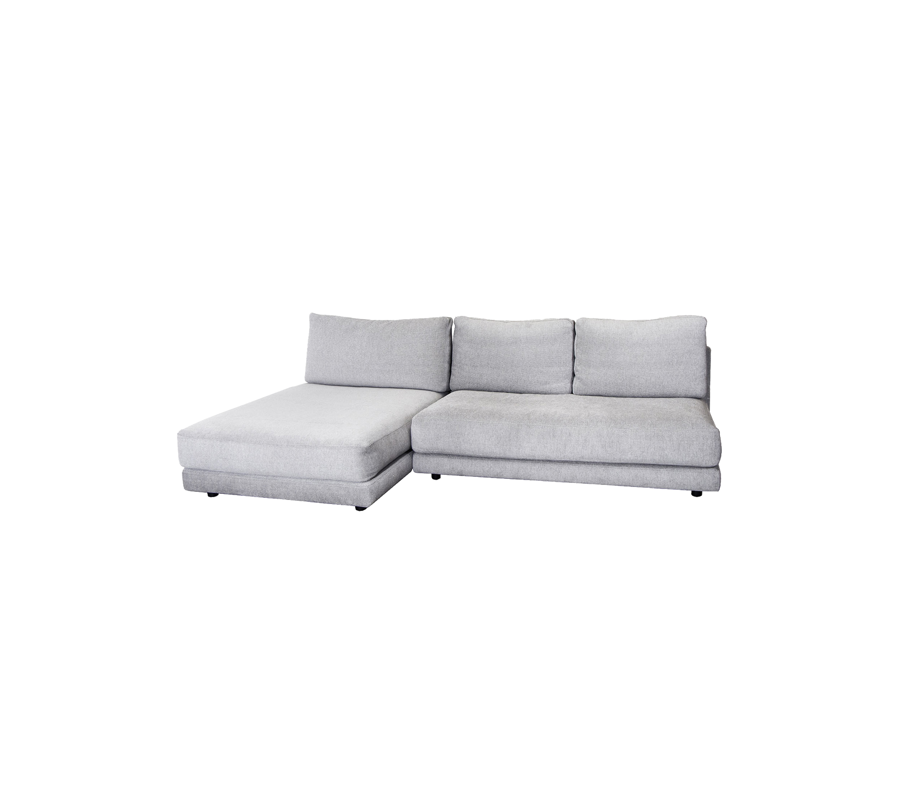 En moderne grå sektion sofa med en komfortabel chaiselong og bløde puder, perfekt til enhver stue.
